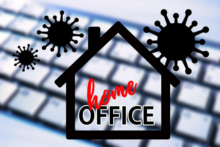 Virus graphics over home office keyboard